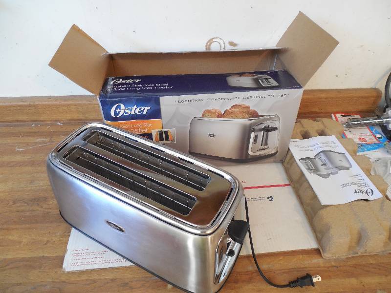 lot 18 image: Oster 4-Slice Long-Slot Toaster, Stainless Steel