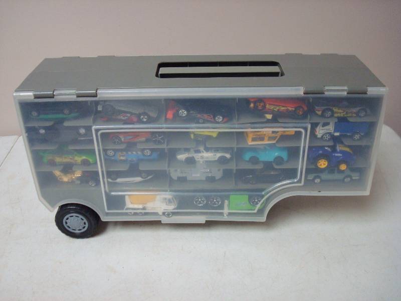 lot 59 image: Case Filled With Cars