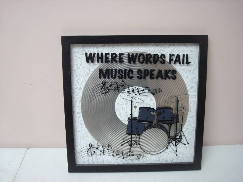 lot 82 image: Music Speaks Framed Picture