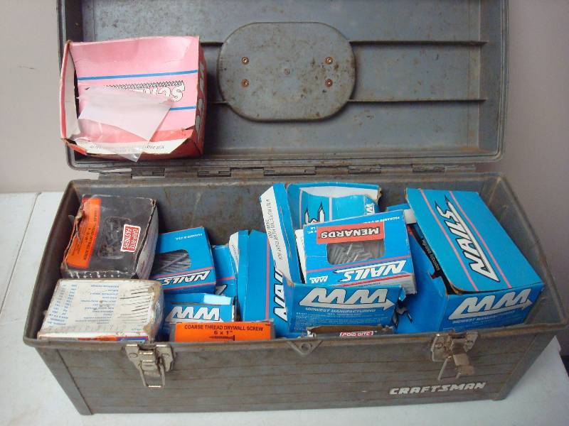 lot 107 image: Box Filled With Different Size Nails And Screws