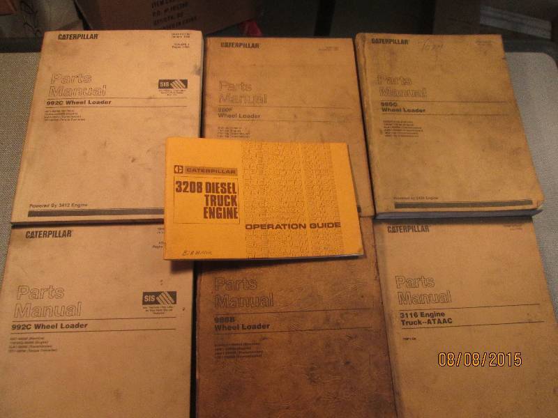 lot of 7 caterpiller parts manuals ...