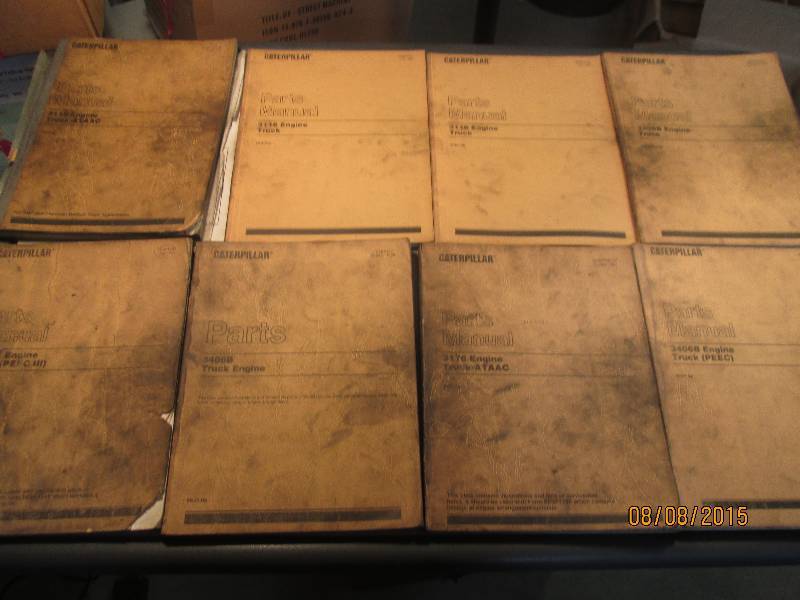 lot of 8  caterpiller parts manuals...