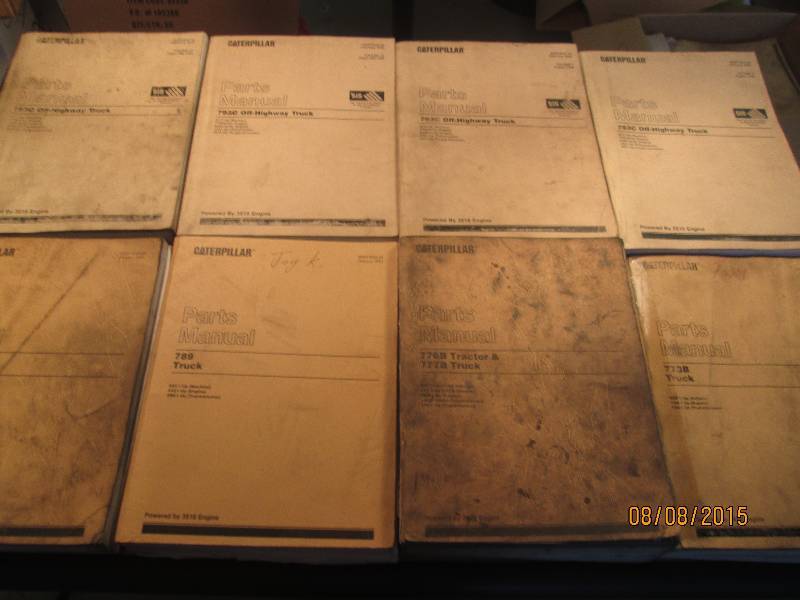 lot of 8 caterpiller parts manuals ...