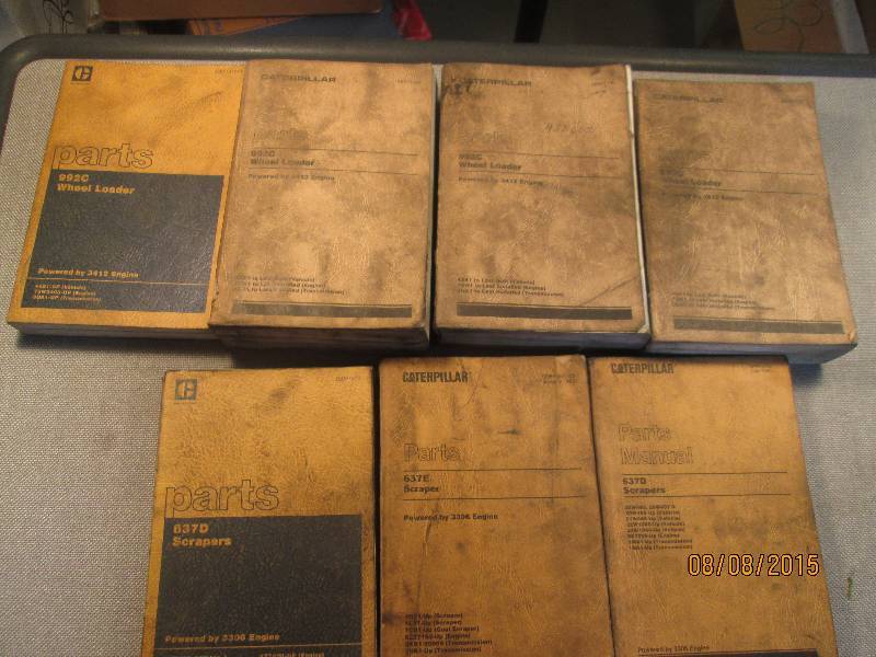 lot of 7 caterpiller parts manuals ...
