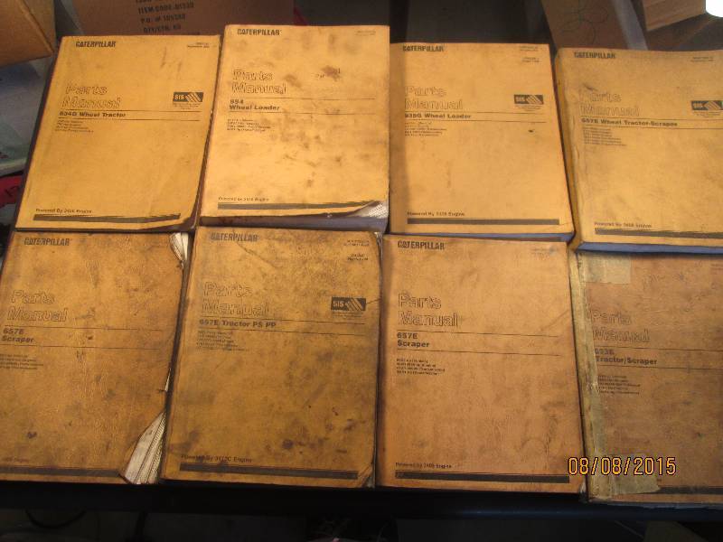 lot of 8 caterpiller parts manuals ...