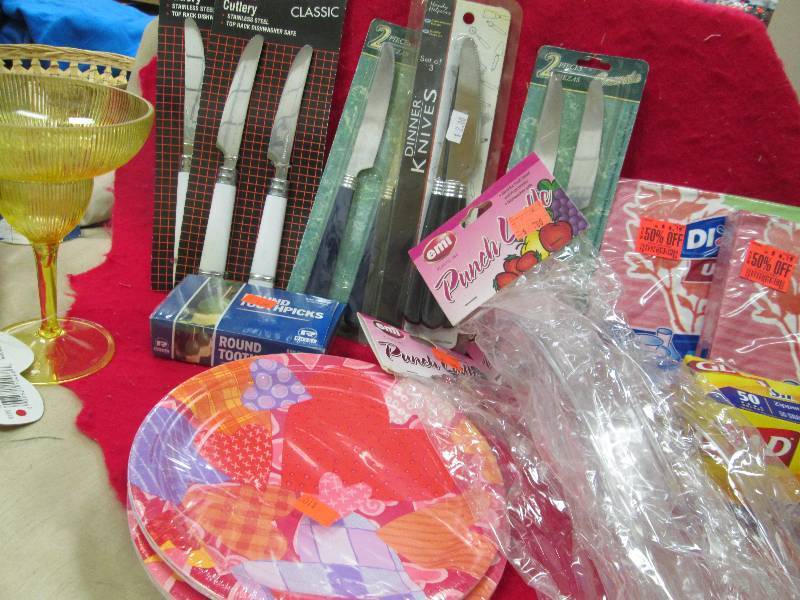 Assortment of butter knives, napkin...