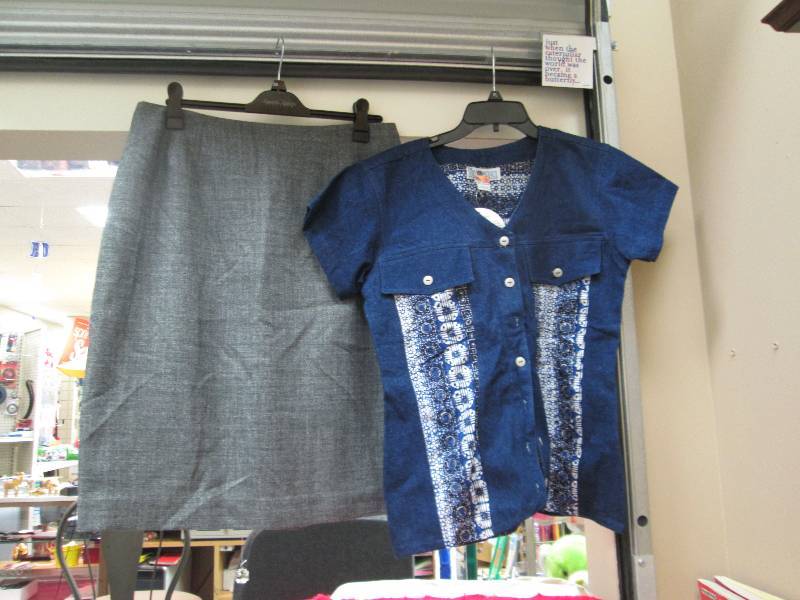 The Daily Planet Clothing and gifts...