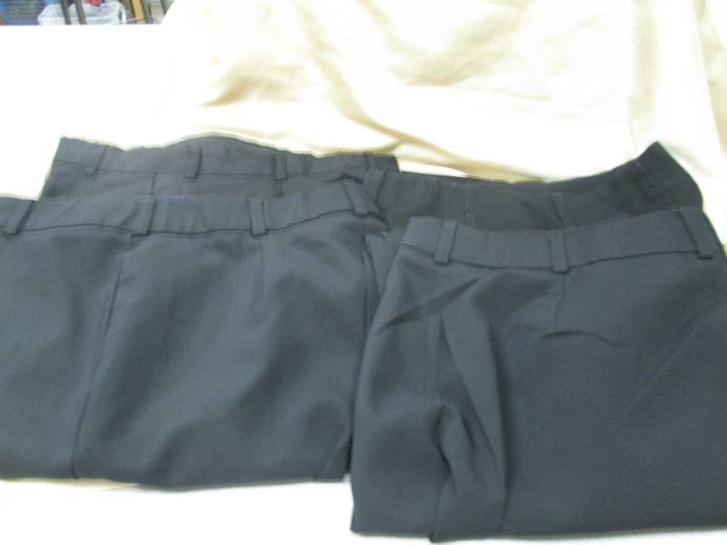 Qty 4 Cintas black dress pants size...