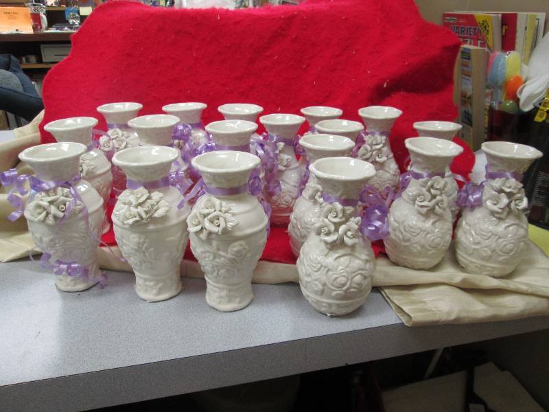 Qty 18 flower vase...
