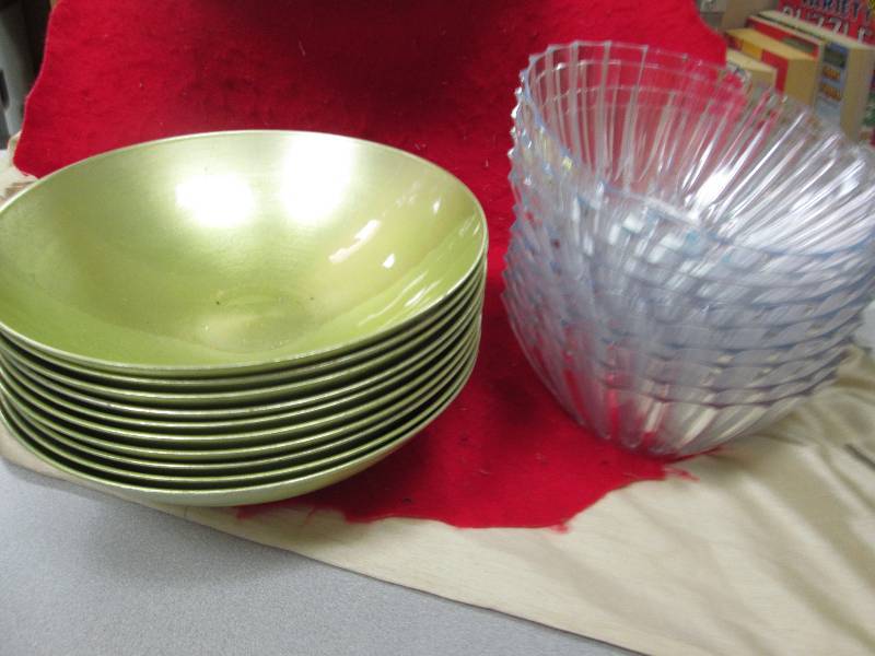 Assortment of clear plastic bowls a...