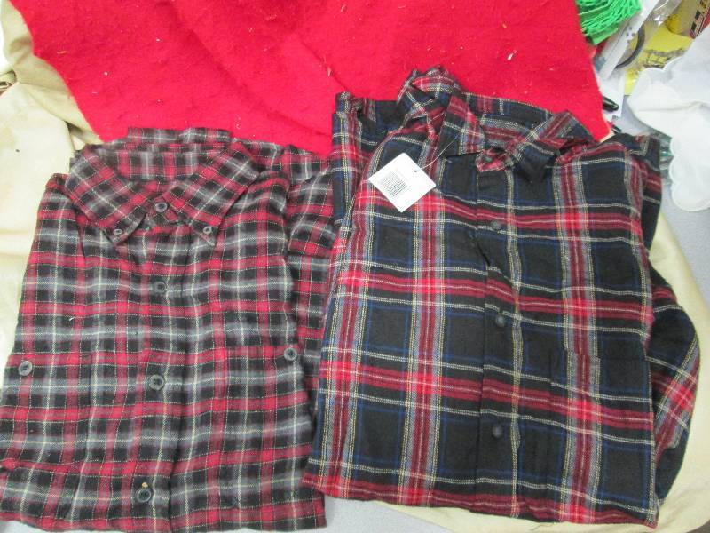 Qty 2 Flannel shirts size small and...