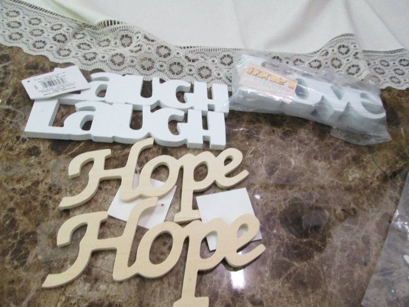 Wooden saying Laugh, Hope, and Love...