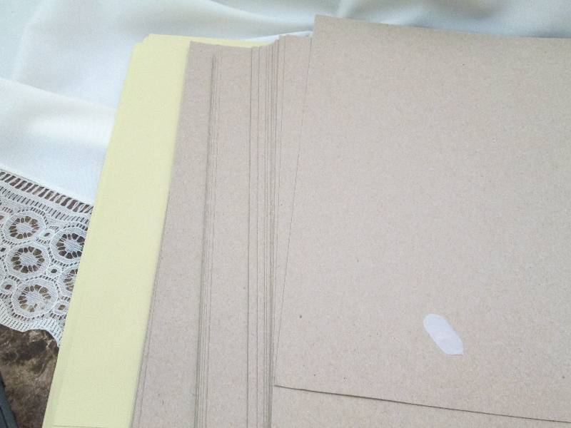 assortment of paper chipboard and y...