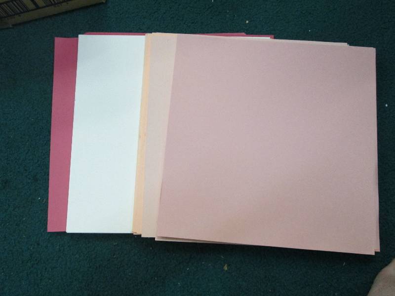 Assotment of paper ruby red, barely...