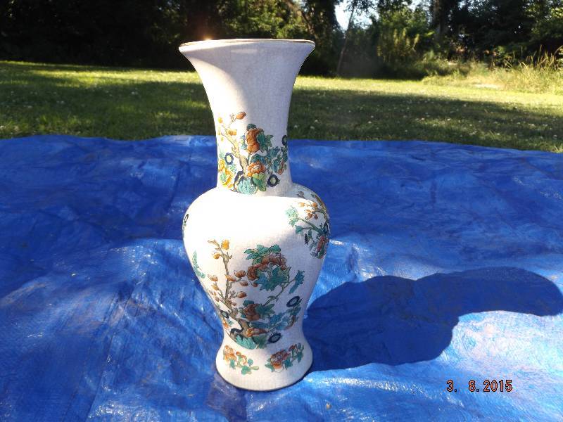 vintage vase with folwers