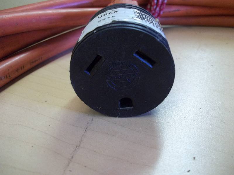 lot 339 image: Heavy Duty Extension Cord & Adapter