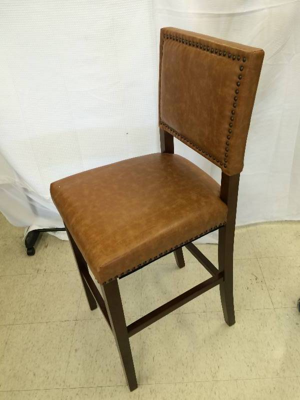 lot 105 image: brown tall chair, wood legs, patterned seat
