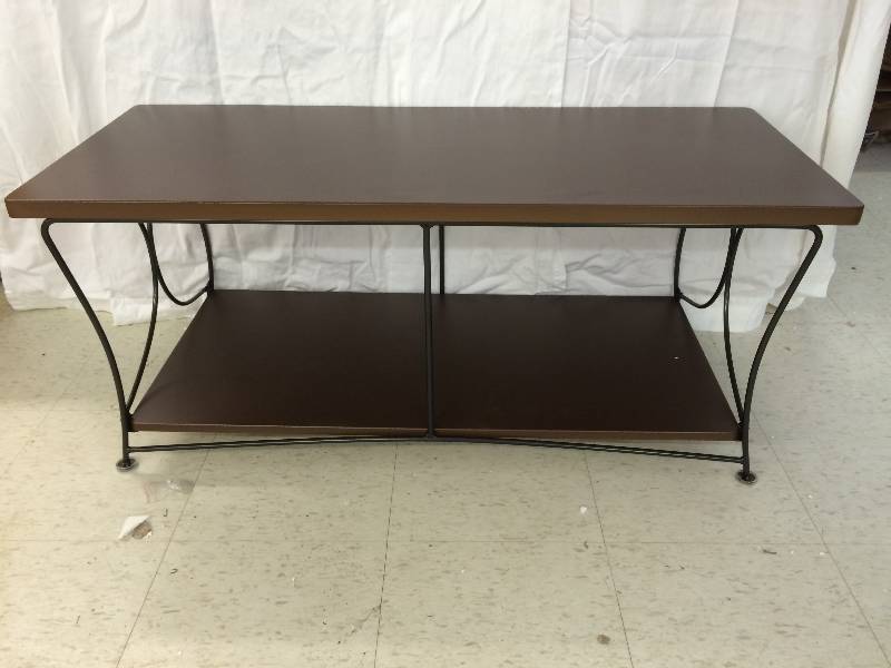 lot 127 image: brown wooden coffee table with black metal frame, new