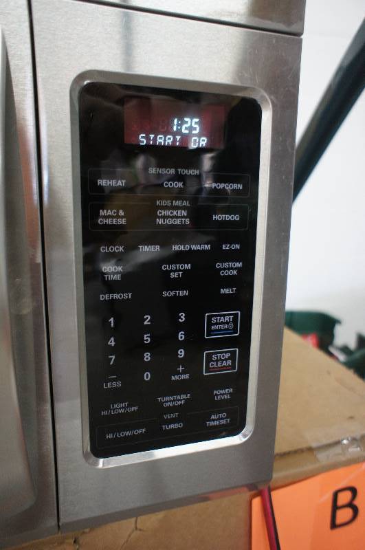 lot 12 image: LG Microwave - Model #(LMV1813ST)