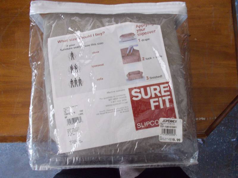 lot 27 image: 2-Love Seat Slip Covers