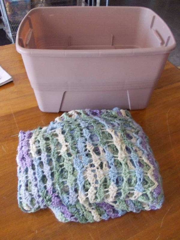 lot 36 image: Hand Crocheted Afghan & 10-Gallon Tote