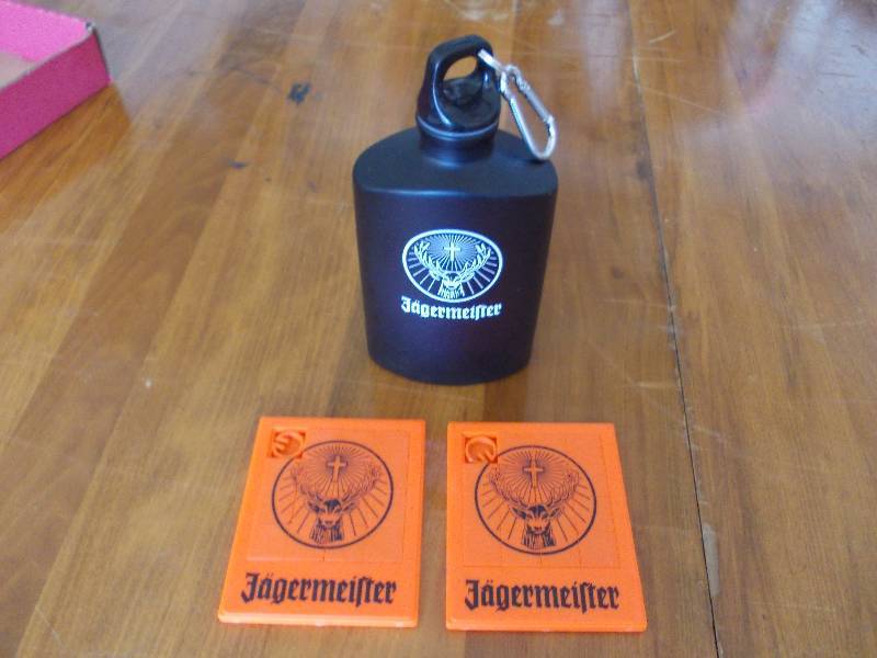 lot 37 image: Jagermeister Flask & 2- Puzzle Games