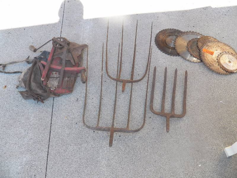 Saw blades, fork heads, grass seeder