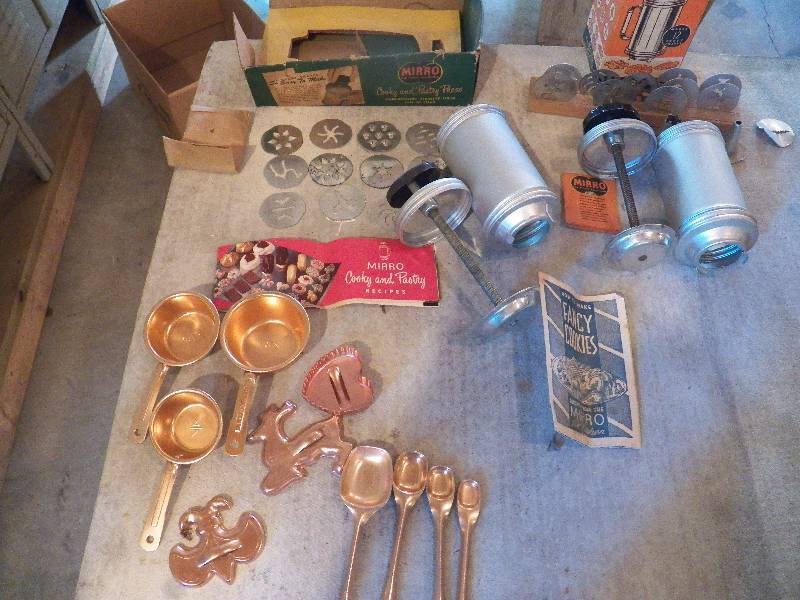 Vintage cookie presses copper colored items