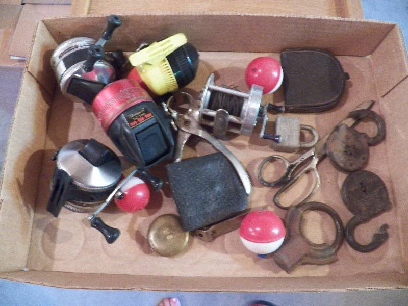 Assorted fishing reels padlocks & misc