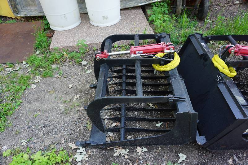 lot 12 image: Universal Mount Bobcat Skid Loader Skid Steer 48 Rock Grapple Bucket