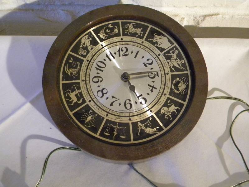 lot 91 image: Zodiac Sign Clock