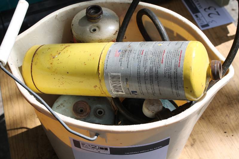 lot 21 image: Bucket Lot Including Gas Cylinders Propane Nozzle wHose Extension.