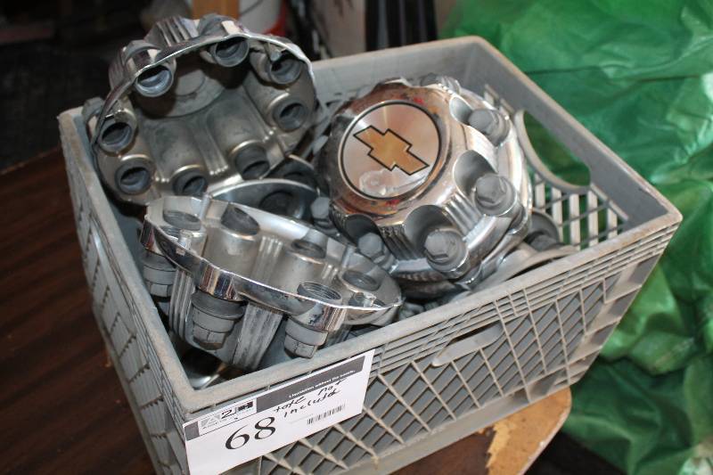 lot 68 image: Tote Lot Including Honda & Chevy HupCap Inserts Tote Not Included.