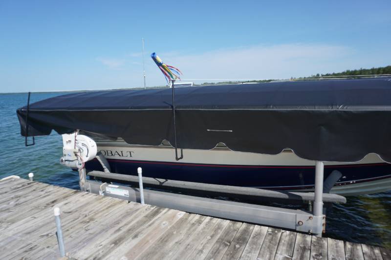 lot 2 image: Shorestation Brand 5000 lb Boat Lift With Solar Powered Lift Tech Lift