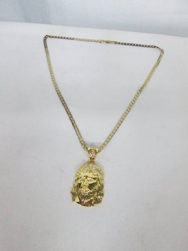 lot 96 image: Goldtone CZ Mens Jesus Pendant