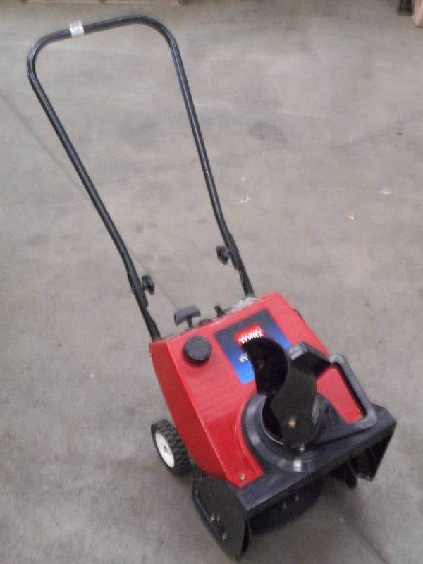 lot 10 image: Toro PowerLite 98cc Electric Start ...