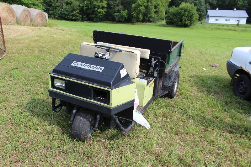lot 13 image: Cushman Powered Industrial Truck  Gator Model No. 898630- Serial No. 93003319 Vin 1CUNH3276PL000555 1 Wheel In Front 2 In Back 27HP 3W Turf Chassis Work Bed Not Running.