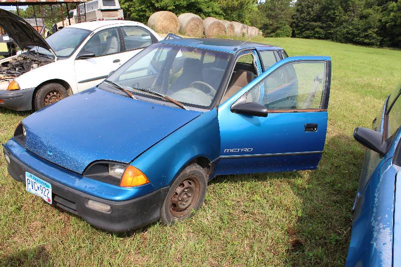 lot 11 image: 1992 Geo Metro VIN 2C1MR6469N6746578 Mileage 54,122 License Plate PVC 922  L3 1.0L (61 CID) Gasoline Engine, Automatic Transmission, Front Wheel Drive, Four Door Sedan.  Very Clean, Very little Rust.  Tow Away Vehicle, Currently not Running.