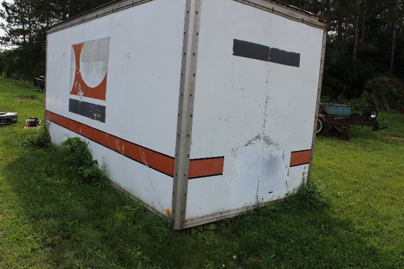 lot 35 image: Commercial Utility Truck Bed wRoll-a-Door Back All Aluminum except base frame 218 x 95 x 105 Contents Not Included.