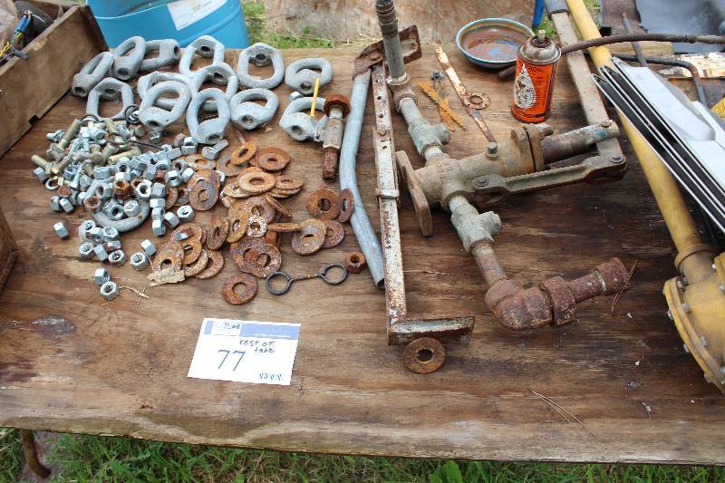 lot 77 image: Remainder of Table Lot Including Metal Hardware Metal Washers Metal Bolts And More.