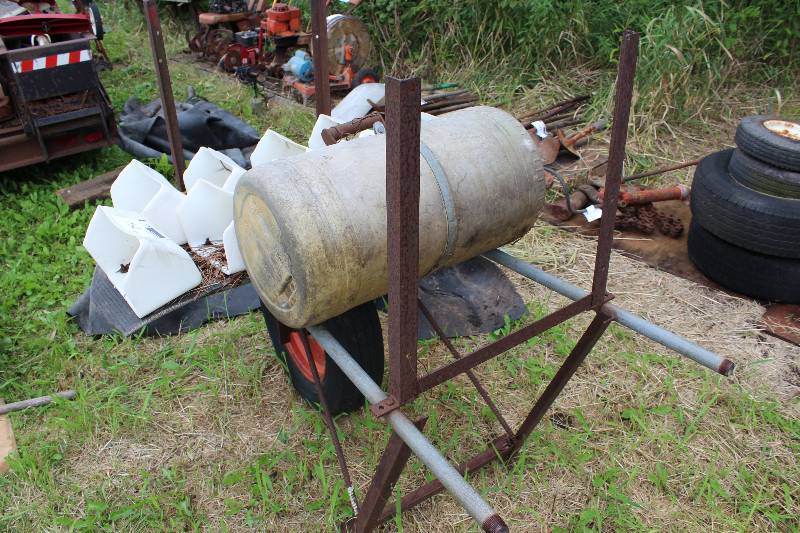 lot 64 image: Metal Cart wWheels & Tank Attachment Includes Lawn Mower Guards, app. 10 ct.