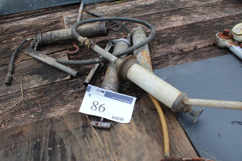 lot 86 image: Lot of (4) Grease Guns wPump Handles & Tube Dispensers.