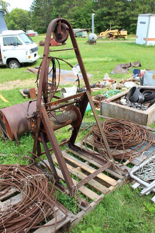 lot 5 image: Kuhlman Sewer Cleaning Machine  Manual Winch System wPulley Crank System, Metal Stand & Multiple Steel Cables Primary Use For Pulling In Boats For Shore-Line Storage.  Great for pulling boat up at the lake cabin.