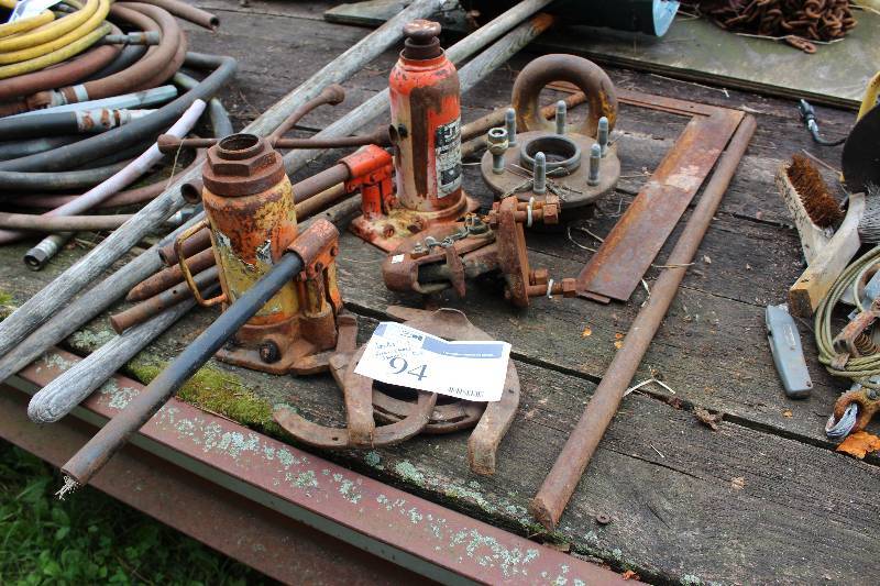 lot 94 image: Lot Including Pump Jacks wHandles (2) Horse Shoes Snow Shovels And More.