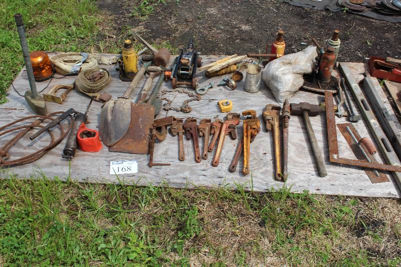 lot 168 image: Tool Lot Including Metal Hammer (7) Pipe Wrenches ranging from 18 to 42 long Pump Jack Metal Shovel And More.