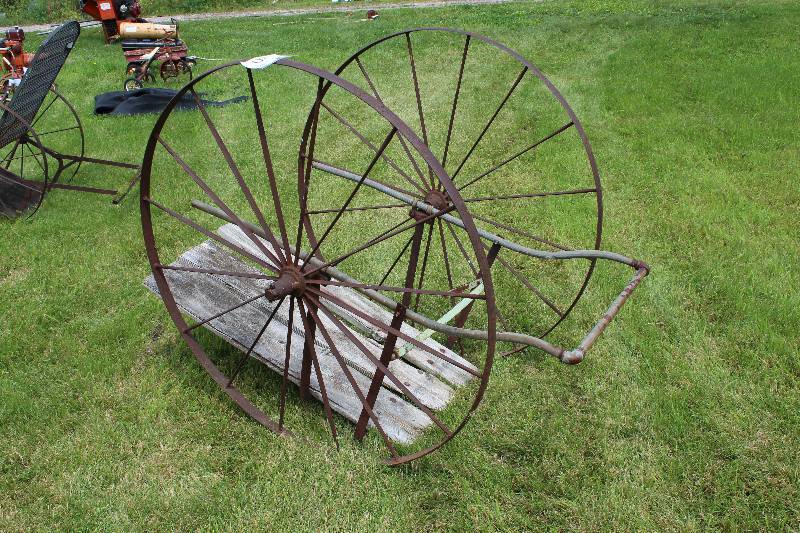 lot 180 image: Metal Cart wWooden Deck & Wagon Wheels 34 x 68 x 51.