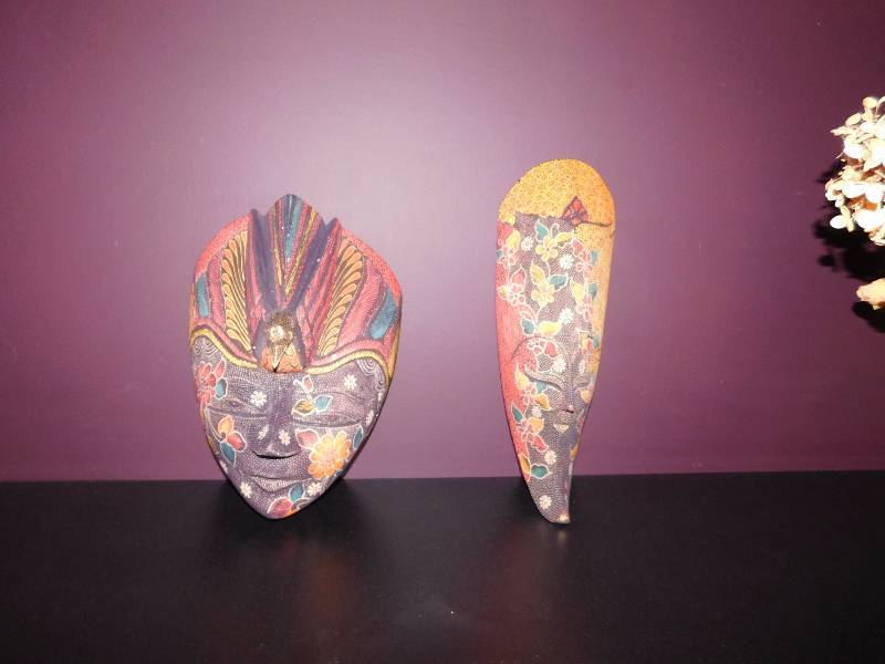 lot 16 image: tribal art masks very colorful male and female