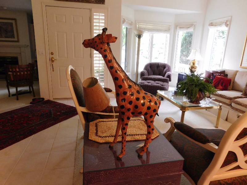 lot 61 image: Quality leather Giraffe please see photos this is nice piece