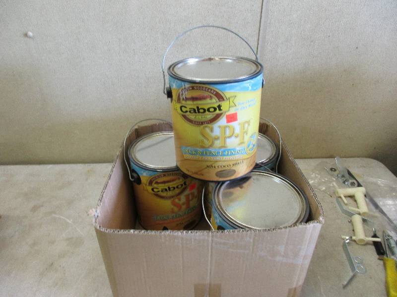 lot 23 image: 4 gallons of stain