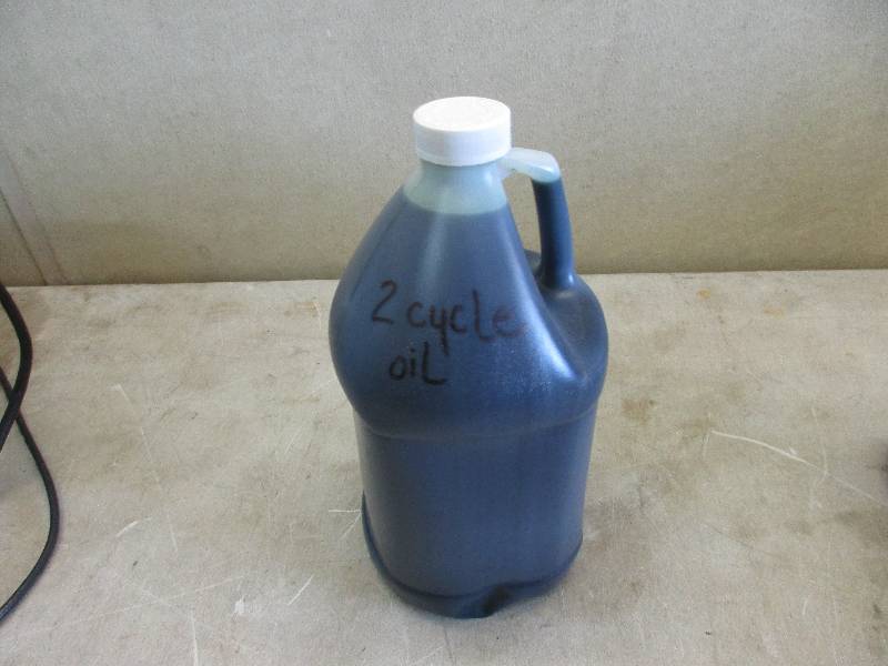 lot 39 image: 2 cycle oil